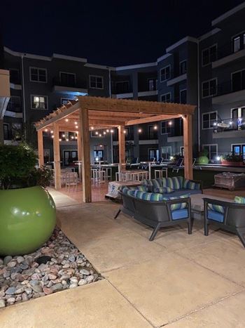 Two outdoor kitchens with dining terrace